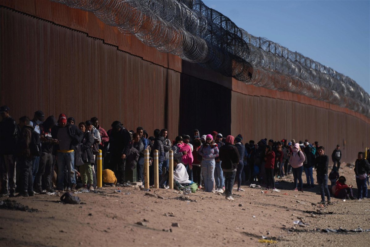 <i>Allison Dinner/AFP/Getty Images</i><br/>Detention facilities along the US-Mexico border have surpassed capacity amid a spike in migrants. Pictured are migrants in El Paso
