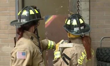 A female firefighter is helping more women enter fire service with a special camp.