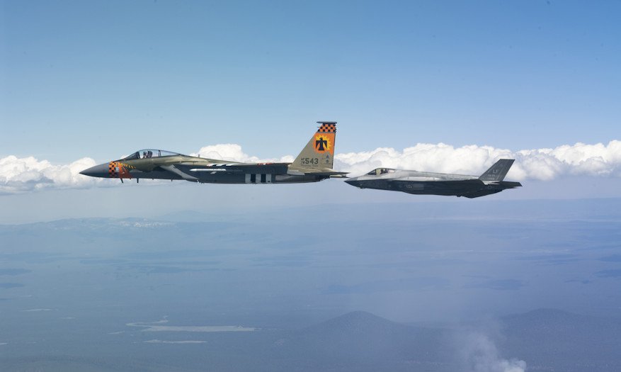 A U.S. Air Force F-35A Lightning II aircraft assigned to Luke Air Force Base, Arizona, flies off the wing of a F-15C Eagle assigned to the 173rd Fighter Wing, May 17, 2023 in the skies above Southern Oregon