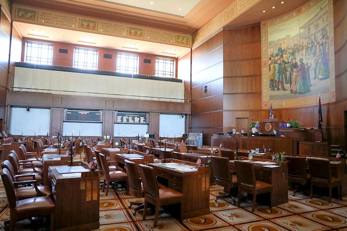 Empty chairs are shown in the Senate chambers prior to a legislative session at the Oregon State Capitol in Salem on May 11