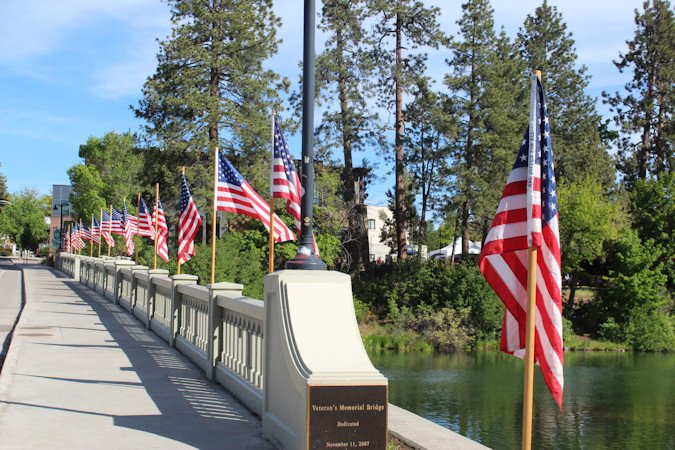 US flags line Bend's Veterans Memorial Bridge on Memorial Day 2022