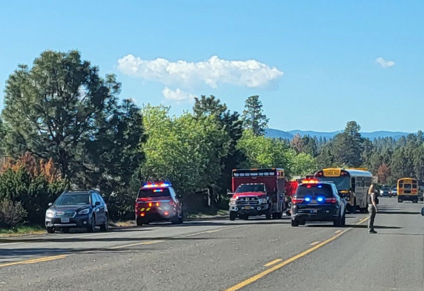 Police, medics were called to SE 27th Street Thursday morning after car, school bus collided