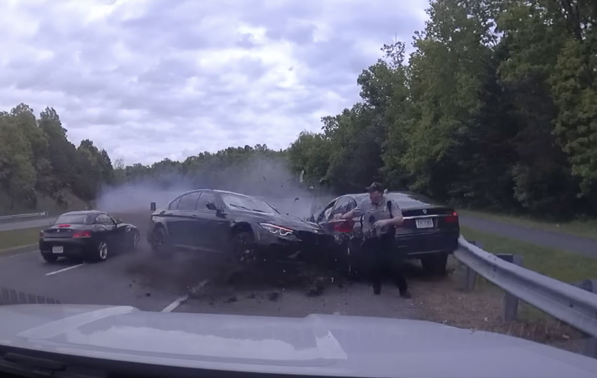 <i>Fairfax County Police</i><br/>A wild video shows a Virginia police officer's extremely close call with an out-of-control car during a traffic stop Monday morning. The video
