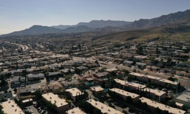 An aerial view shows homes and apartments in a neighborhood in El Paso