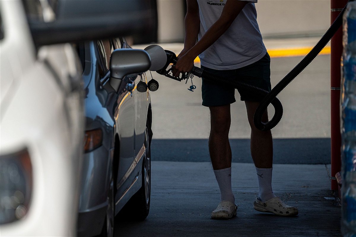 <i>David Paul Morris/Bloomberg/Getty Images</i><br/>Drivers across the country will be greeted by gas prices much cheaper than a year ago. A customer refuels at a Safeway gas station in Hercules