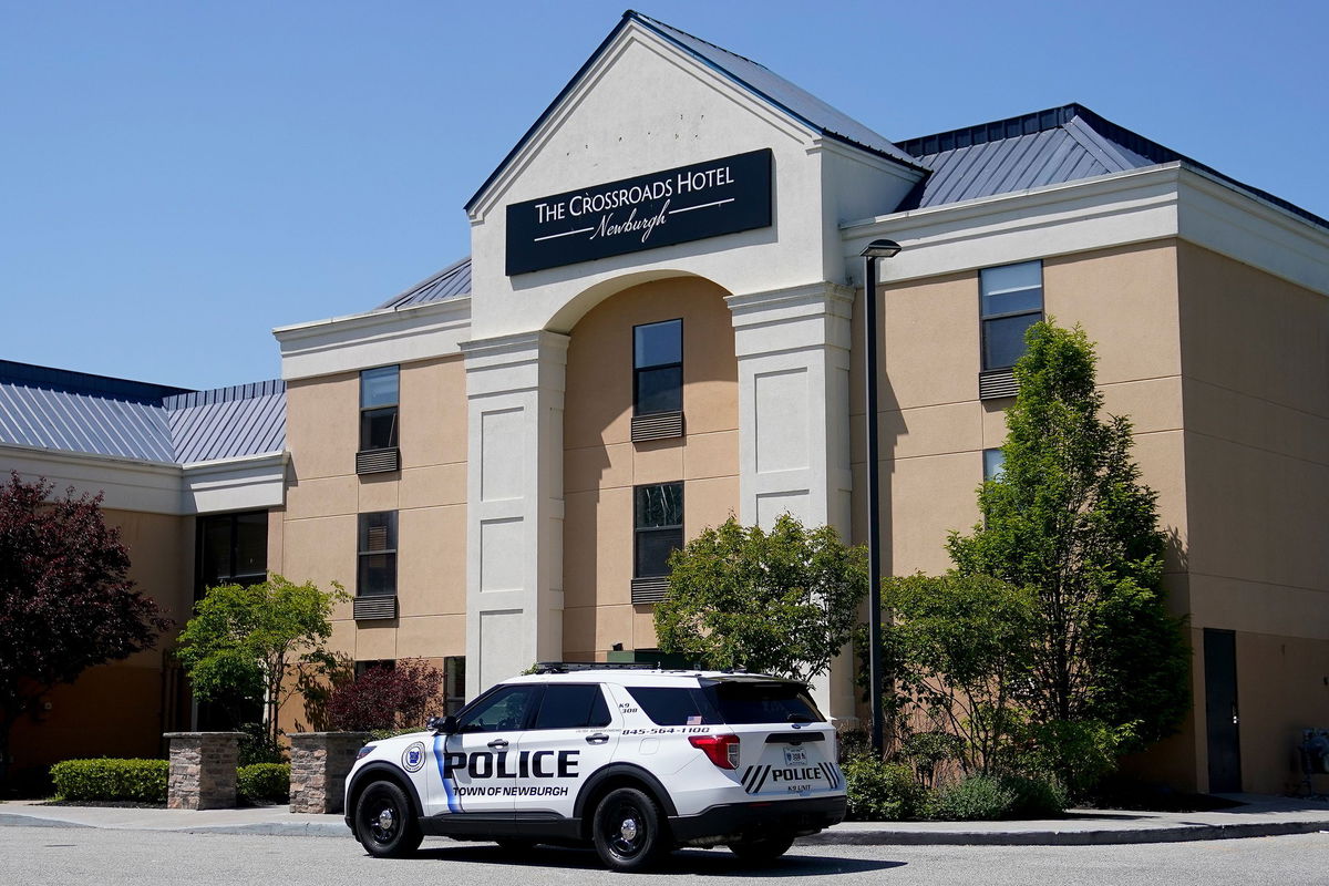 <i>John Minchillo/AP/FILE</i><br/>A Town of Newburgh police vehicle sits parked outside The Crossroads Hotel