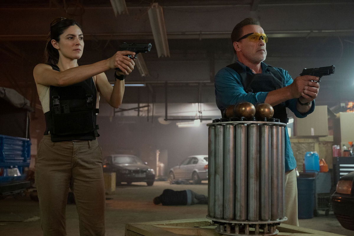 <i>Christos Kalohoridis/Netflix</i><br/>Monica Barbaro and Arnold Schwarzenegger in 