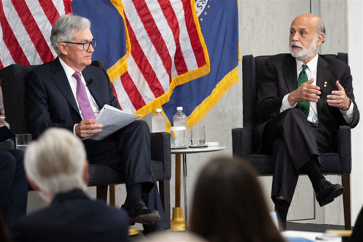 <i>Saul Loeb/AFP/Getty Images</i><br/>Federal Reserve Board Chair Jerome Powell and former Federal Reserve Board Chair Ben Bernanke (R) participate in a discussion at the Federal Reserve Board building in Washington