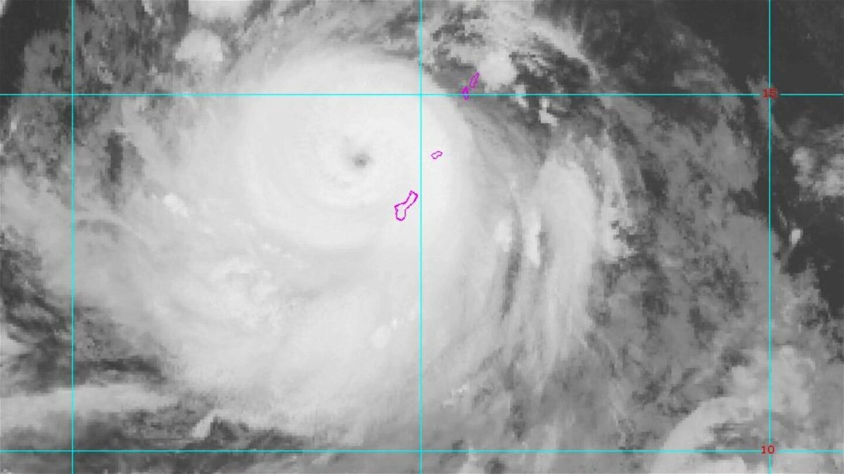 <i>NOAA via AP</i><br/>An NOAA satellite image shows Typhoon Mawar passing over Guam on May 24