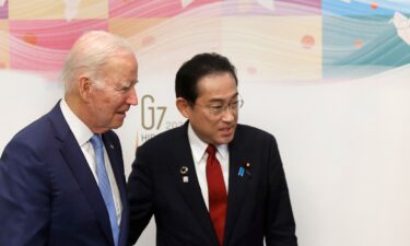 President Joe Biden shakes hands with Japan's Prime Minister Fumio Kishida prior to a bilateral meeting in Hiroshima