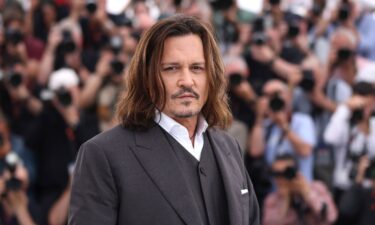 Johnny Depp poses for photographers in Cannes on Wednesday.