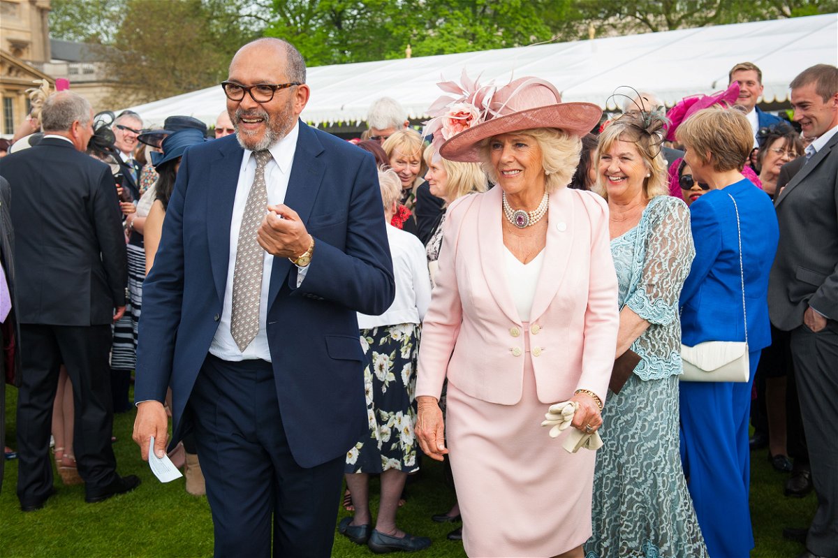<i>Dominic Lipinski/WPA Pool/Getty Images/File</i><br/>Bruce Oldfield and Camilla at Buckingham Palace in honor of children's charity in 2016.