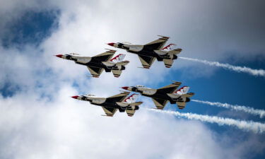 US Air Force Thunderbird F-16D Fighting Falcons fly in a diamond formation.