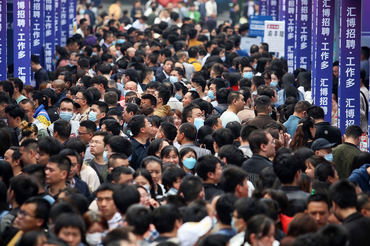 <i>AFP/Getty Images</i><br/>Pictured is a crowded job fair in the southwestern Chinese city of Chongqing on April 11.