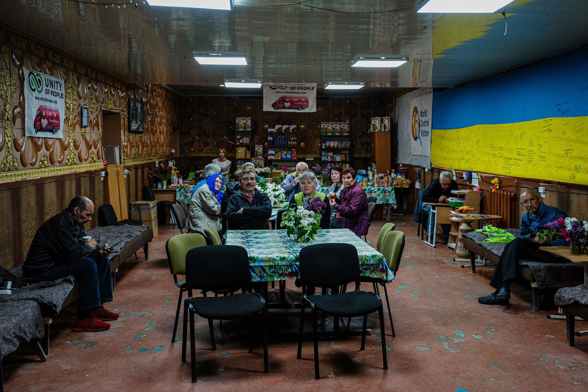 <i>Dimitar Dilkoff/AFP/Getty Images</i><br/>Local residents sit in a volunteer run shelter