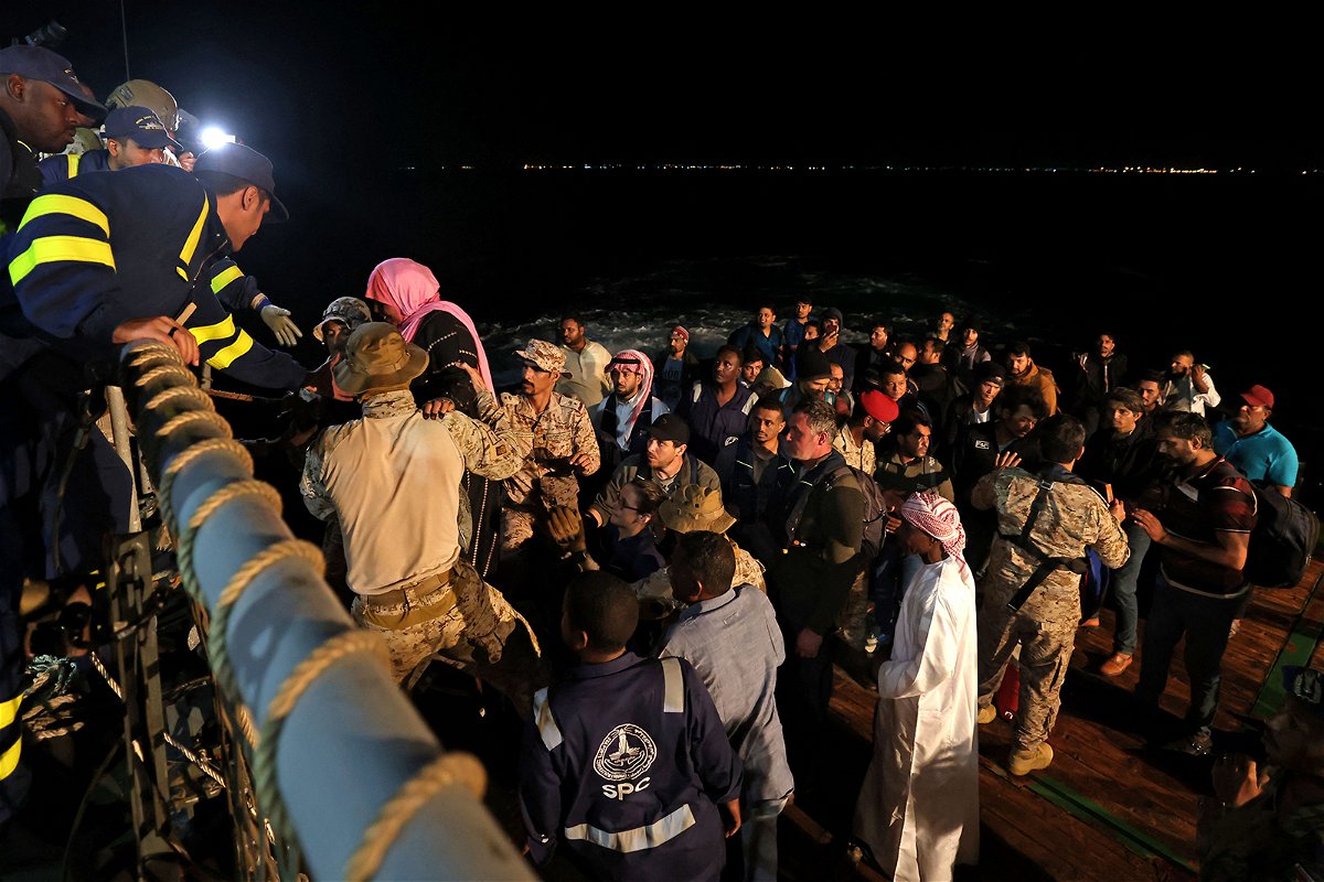 <i>Fayez Nureldine/AFP/Getty Images</i><br/>Saudi forces hoist evacuees aboard a vessel during a rescue operation from Port Sudan to Jeddah