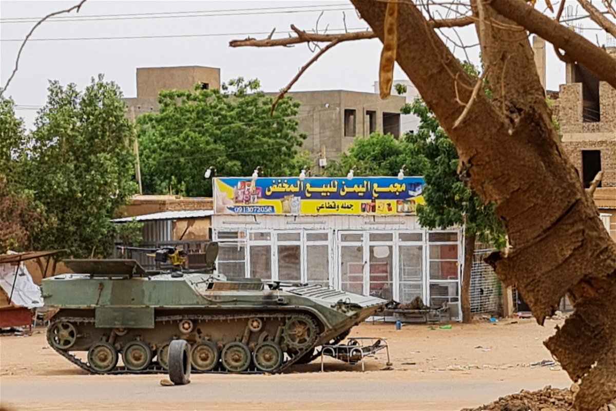 <i>AFP/Getty Images</i><br/>Sudanese Army soldiers rest near a tank at a checkpoint in Khartoum on April 30