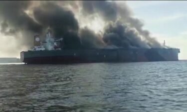 The oil tanker caught fire in waters off the coast of southern Malaysia on Monday