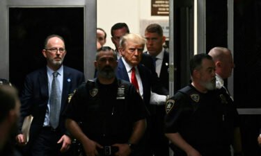 Former US President Donald Trump is seen here inside the Manhattan Criminal Courthouse in New York on April 4. A New York judge will hear arguments on May 4 over a proposed protective order in Trump's criminal case.
