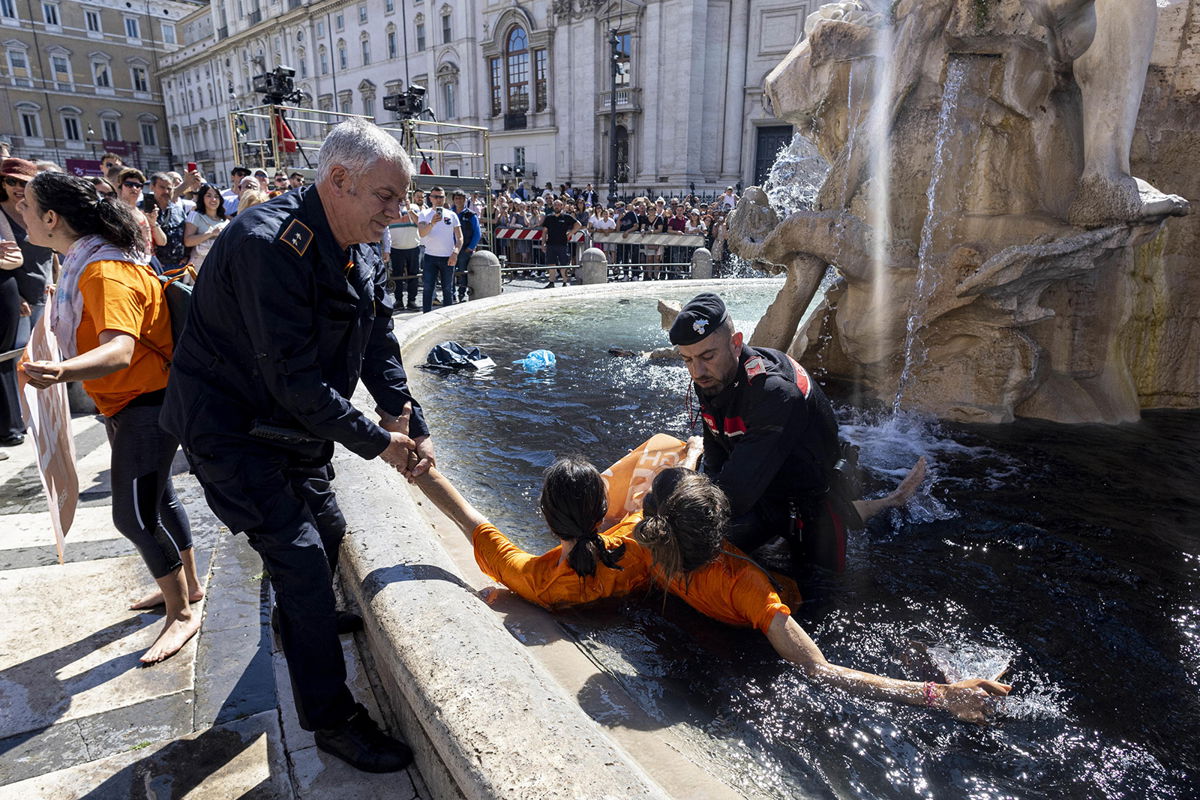 <i>Massimo Percossi/EPA-EFE/Shutterstock</i><br/>Last Generation climate activists are detained on May 6