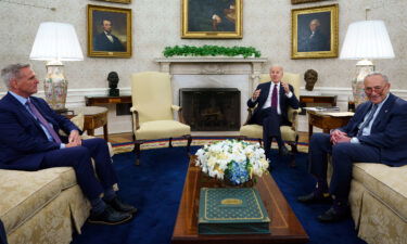 House Speaker Kevin McCarthy and Senate Majority Leader Chuck Schumer meet with President Joe Biden to discuss the national debt limit in the Oval Office of the White House on Tuesday in Washington