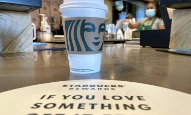 The Starbucks logo is displayed on a cup at a Starbucks store in October 2021 in Marin City
