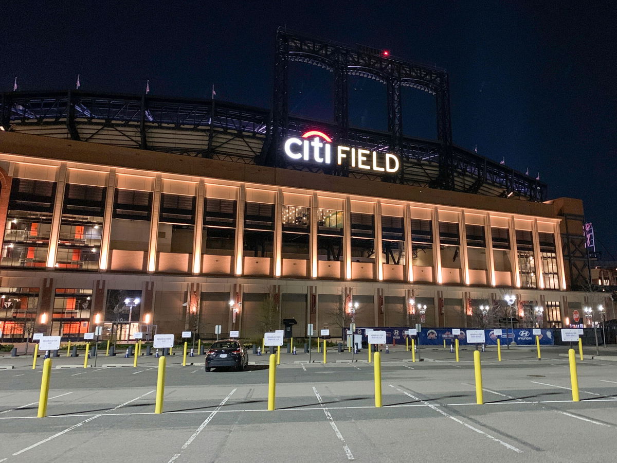 <i>Benno Schwinghammer/picture alliance/Getty Images</i><br/>Parking lots at the Mets baseball stadium at Citi Field is one of the places being considered to house migrants ahead of an expected surge.