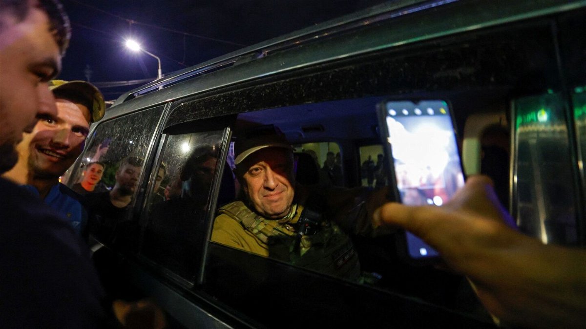 <i>Alexander Ermochenko/Reuters</i><br/>Wagner mercenary chief Yevgeny Prigozhin leaves the headquarters of the Southern Military District amid the group's pullout from the city of Rostov-on-Don