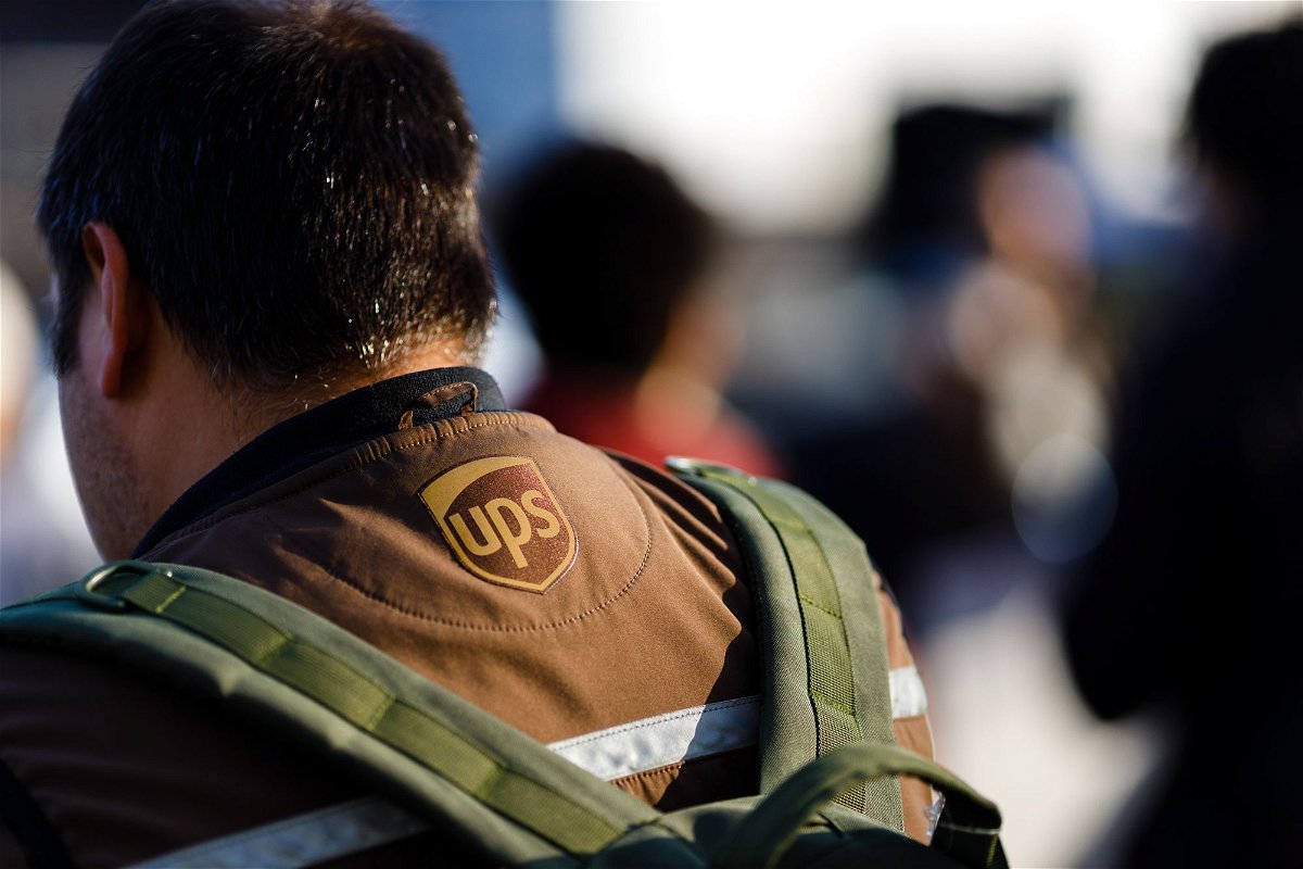 <i>Paul Frangipane/Bloomberg/Getty Images</i><br/>UPS workers and Teamsters members during a rally outside a UPS hub in the Brooklyn borough of New York