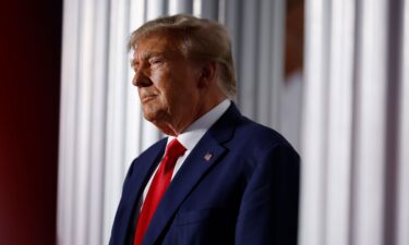 Former U.S. President Donald Trump delivers remarks outside the clubhouse at the Trump National Golf Club on June 13 in Bedminster