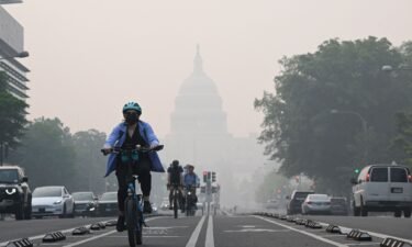 Record-breaking smog due to smoke from Canada's wildfires partially obscures the US Capitol in Washington on June 8. People with chronic lung and heart conditions should continue to monitor air quality