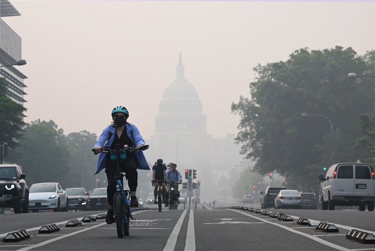 <i>Mandel Ngan/AFP via Getty Images</i><br/>Record-breaking smog due to smoke from Canada's wildfires partially obscures the US Capitol in Washington on June 8. People with chronic lung and heart conditions should continue to monitor air quality