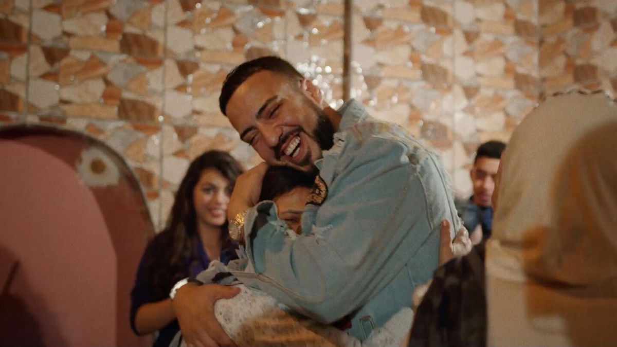 <i>Bryant Robinson</i><br/>French Montana hugs his mother