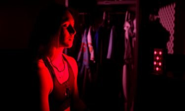 Kelsie Whitmore of the Staten Island FerryHawks baseball team uses red light therapy in her locker room on September 8