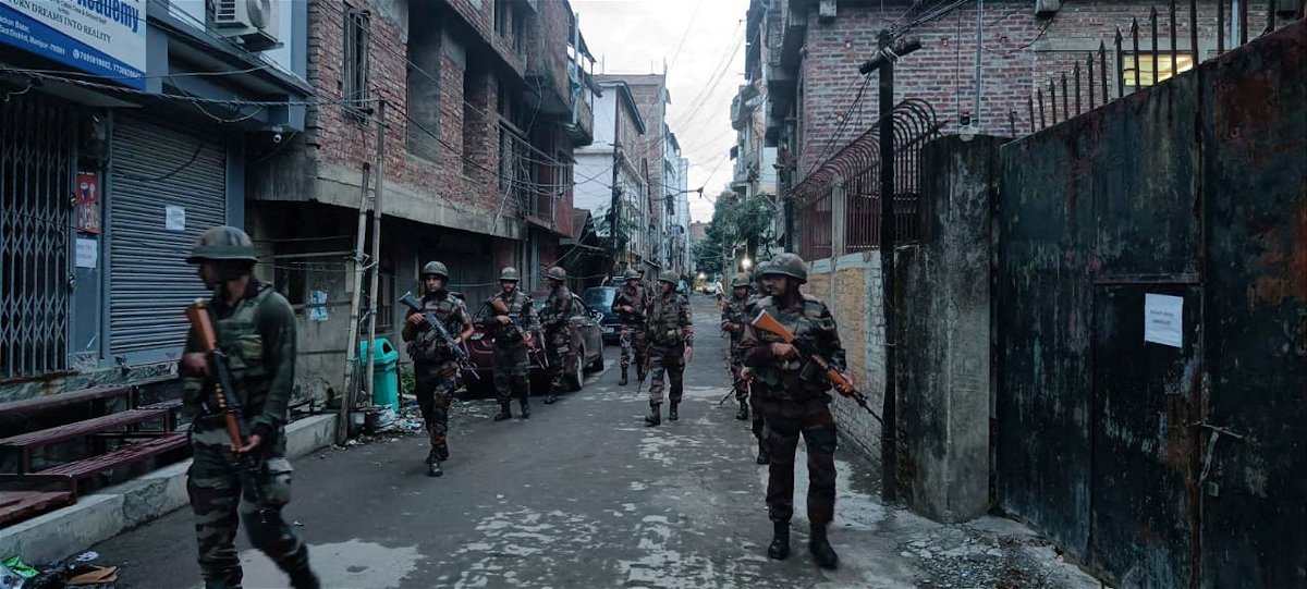 <i>Indian Army/Reuters</i><br/>Indian army soldiers patrol the streets of Manipur on June 7.