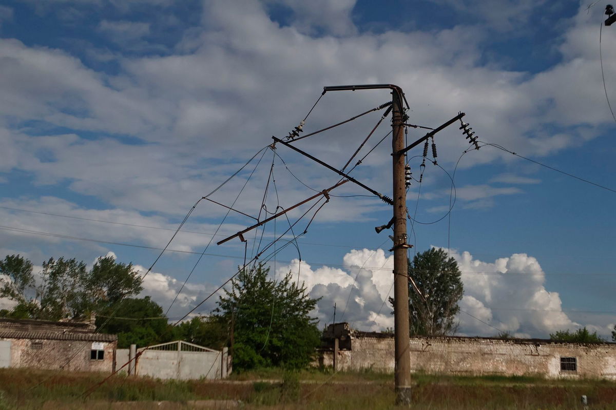 <i>Yan Dobronosov/Global Images Ukraine/Getty Images</i><br/>An electricity pylon and power lines in Kupiansk