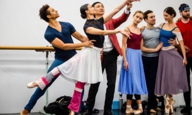 Artistic director of the Queensland Ballet Li Cunxin instructs dancers at a studio in Brisbane.