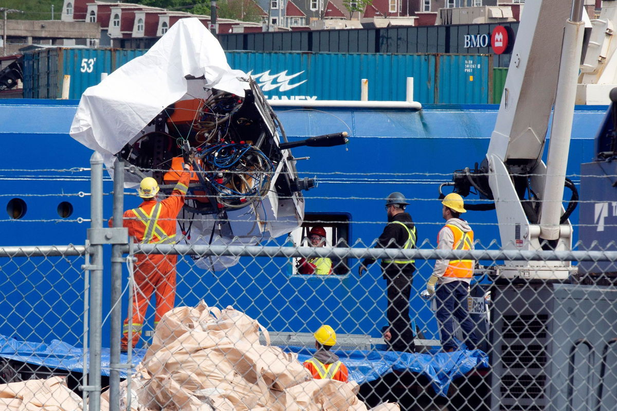 <i>Paul Daly/The Canadian Press/AP</i><br/>Titan debris brought up from the ocean floor is unloaded Wednesday from the Horizon Arctic ship at the Canadian Coast Guard pier in St. John's.