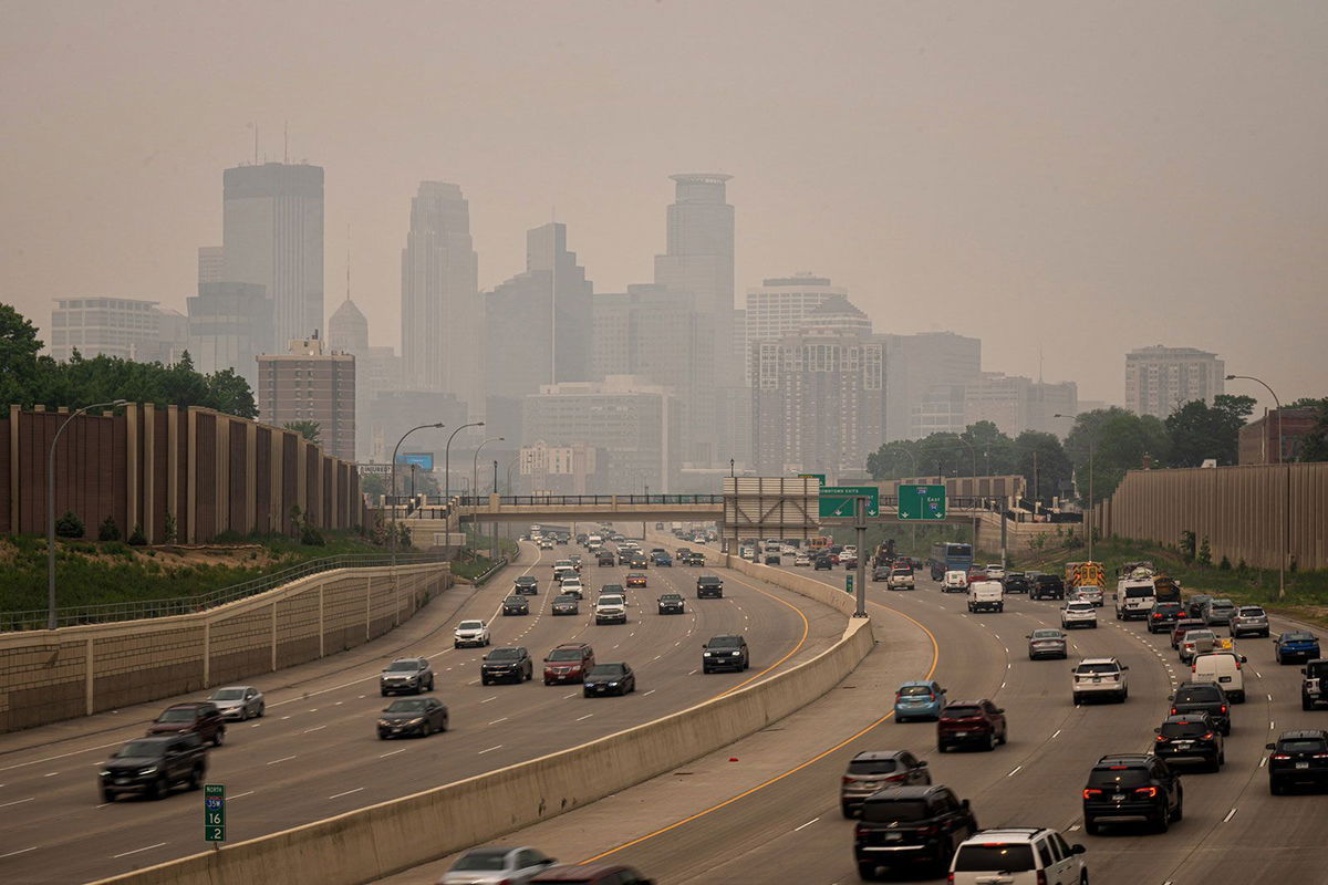 <i>Glen Stubbe/Star Tribune/Getty Images</i><br/>A haze enveloped Minneapolis as seen from the south across I-35W on Wednesday.