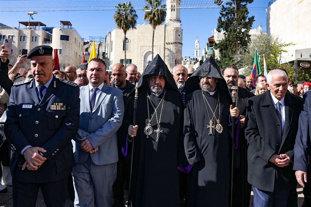 <i>Hazem Bader/AFP/Getty Images</i><br/>Patriarch Nurhan Manougian (C) of the Armenian Patriarchate of Jerusalem arrives to the Church of the Nativity in the occupied West Bank city of Bethlehem