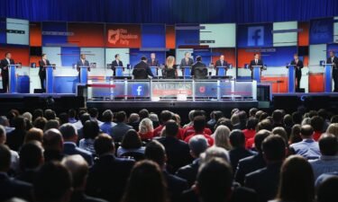 Guests watch candidates speak during the first Republican presidential debate of the 2016 campaign cycle in Cleveland on August 6