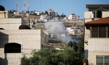 Smoke is seen rising into the air during an Israeli raid in Jenin