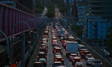Vehicles sit in traffic while exiting the Williamsburg Bridge on May 10 in New York City.