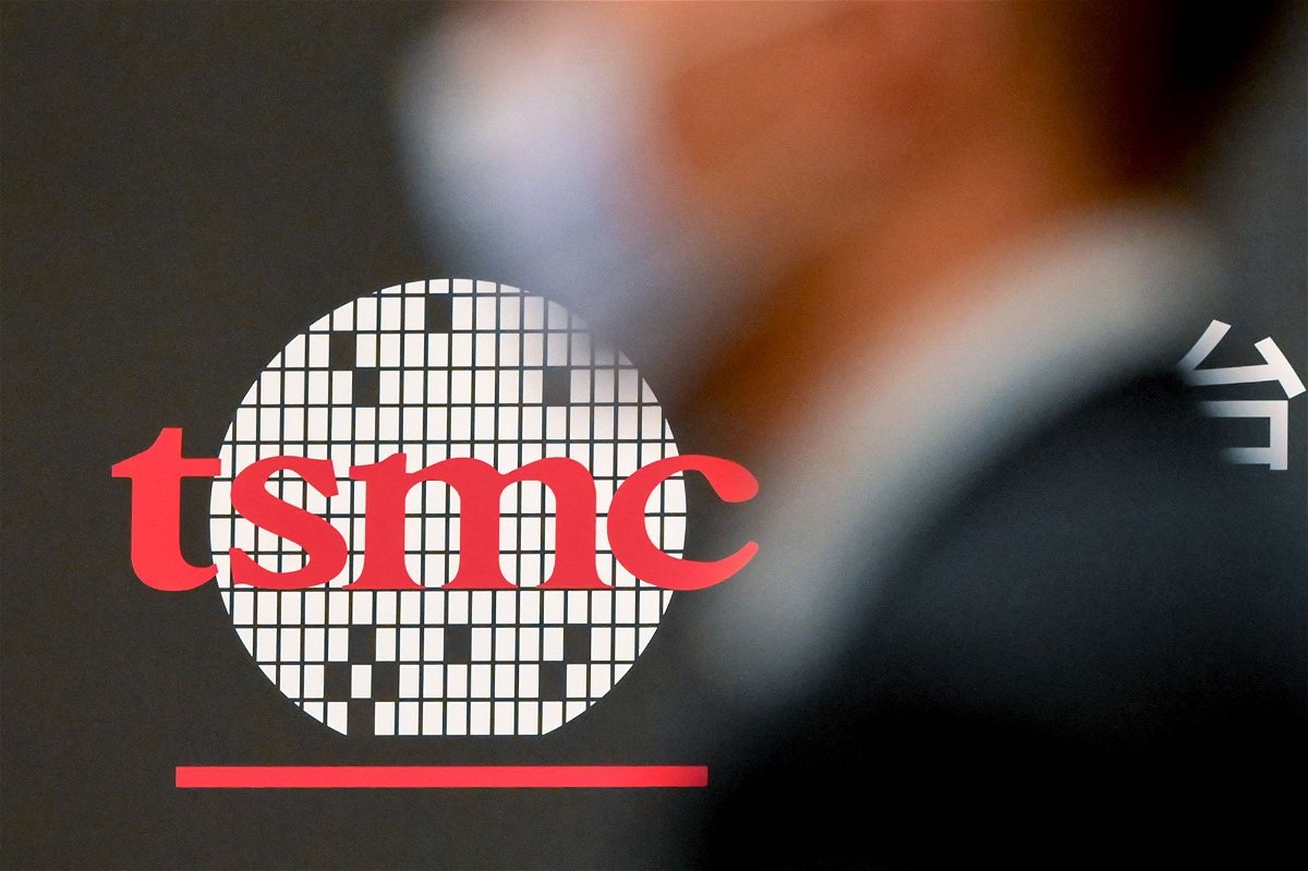<i>Sam Yeh/AFP/Getty Images</i><br/>A man walks past a logo of Taiwan Semiconductor Manufacturing Company.