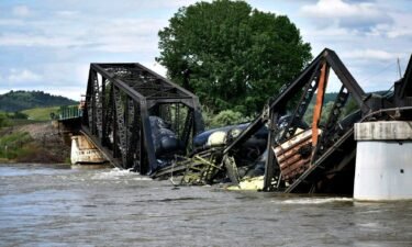 Several train cars fell in the Yellowstone River after a bridge collapse near Columbus