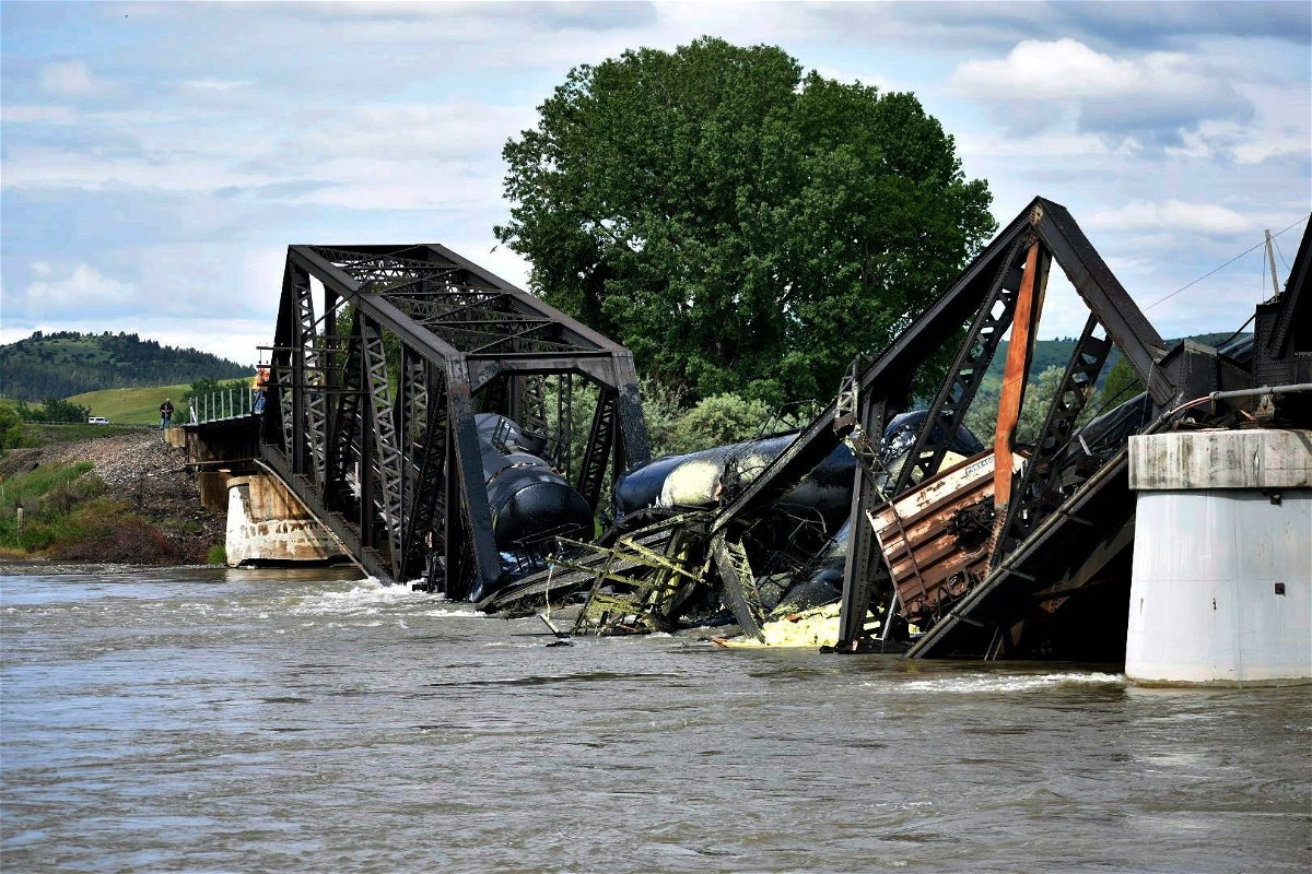 <i>Matthew Brown/AP</i><br/>Several train cars fell in the Yellowstone River after a bridge collapse near Columbus