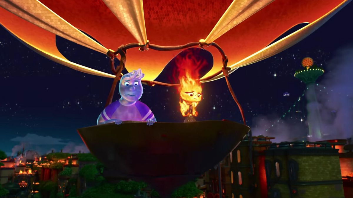 <i>Pixar Animation Studios</i><br/>Wade (voiced by Mamoudou Athie) and Ember (Leah Lewis) in Pixar's 