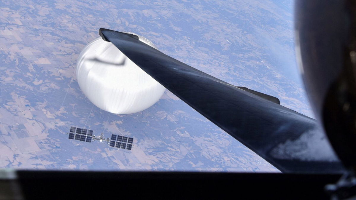 <i>U.S. Air Force/Department of Defense/Handout/Reuters</i><br/>A US Air Force U-2 pilot looks down at the Chinese surveillance balloon as it hovers over the central continental United States on February 3.