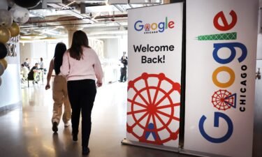 Employees are welcomed back to work with breakfast in the cafeteria at the Chicago Google offices on April 5