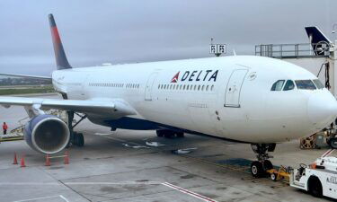 A Delta Air Lines flight from Michigan to Florida was diverted to Atlanta due to an incident with an unruly passenger
